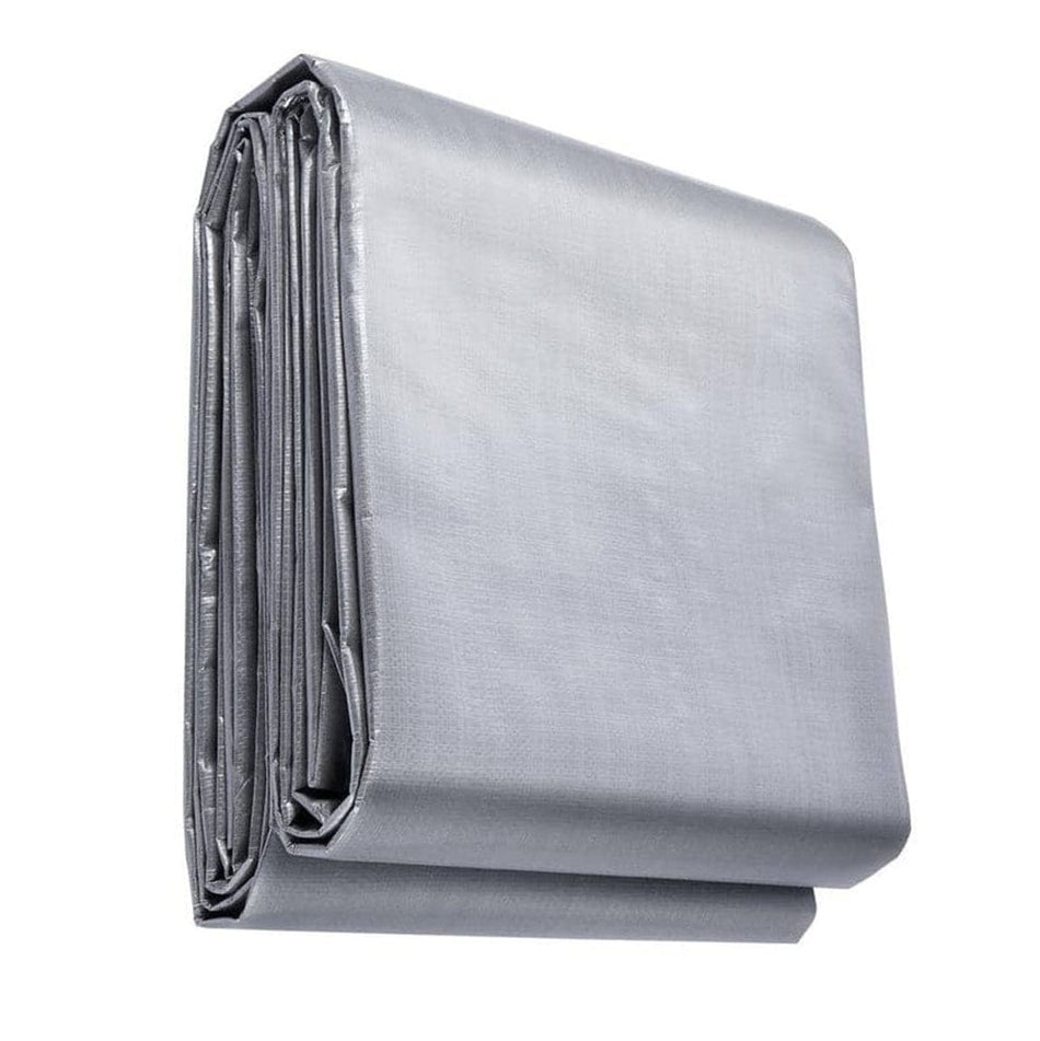 Folded silver reflective tarp on a white background