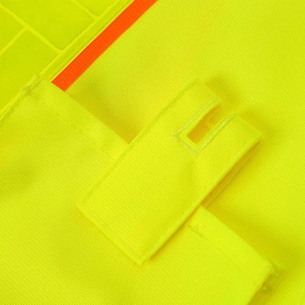 Close-up shot of the specialized cell phone pocket on the high-visibility polyester vest designed to keep communication devices secure on the jobsite.