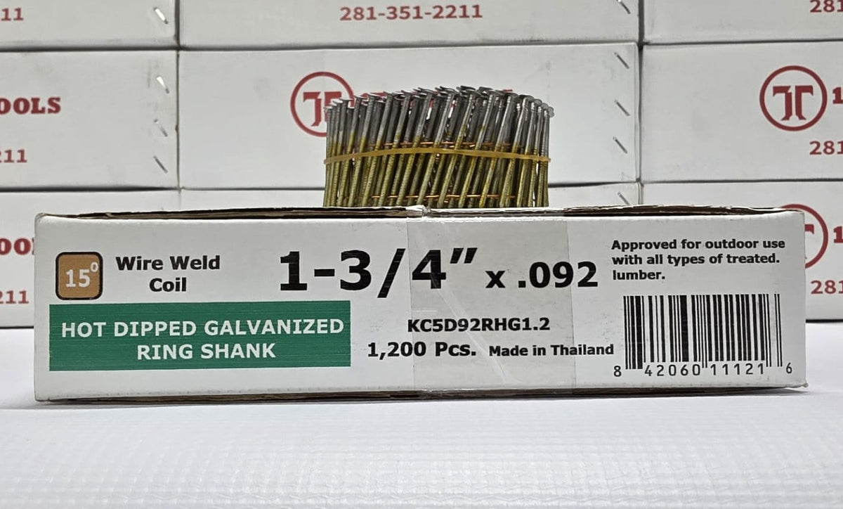 a box of nails with a coil of nails sitting on top