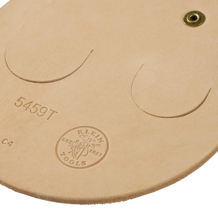 Close-up view of the Klein 5459T leather body showing stamped model markings, dual die-cut tool slots, and heavy-duty structural rivets.