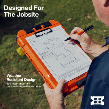 An outdoor shot shows a person holding an orange rugged clipboard with a house plan and writing on it. Text on the image highlights the product's weather-resistant design, and the MOD BOX logo appears in the bottom right corner.