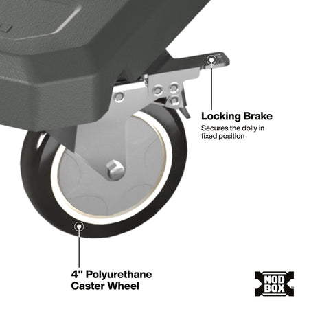 An image presents a clean technical close-up of a heavy-duty swivel caster wheel and locking brake assembly mounted to the underside of a Klein Tools MODbox™ rolling dolly.   