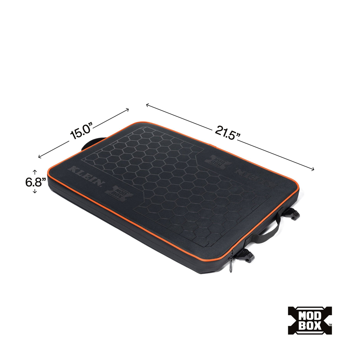 A black rectangular training mat with orange trim and a honeycomb texture, shown with dimension arrows and labels indicating 15.0 inches by 21.