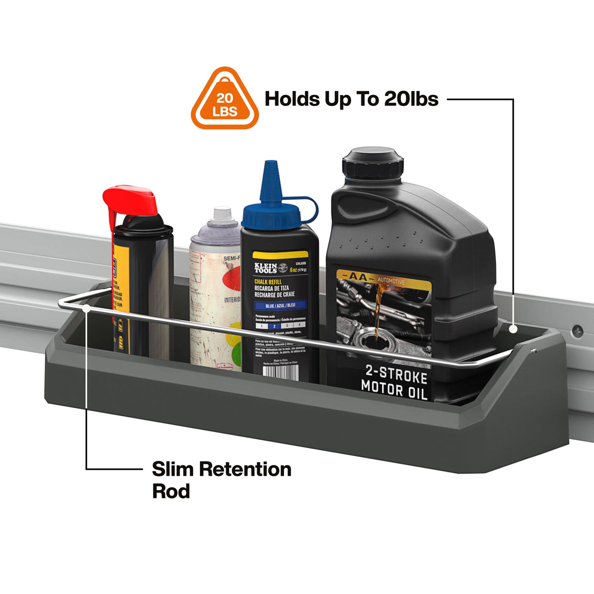 A dark gray metal wall-mounted storage tray shown mounted on a silver rail, holding several automotive products including a black 2-stroke motor oil bottle, a black spray can, and a blue squeeze bottle. Text callouts read 'Slim Retention Rod,' 'Holds Up To 20lbs,' and '20 LBS,' on a white background.