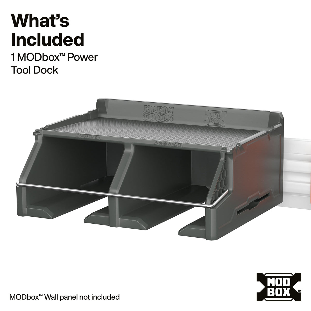 A dark gray plastic tool dock with two compartments, shown on a white background with text detailing what is included and a MODbox logo.