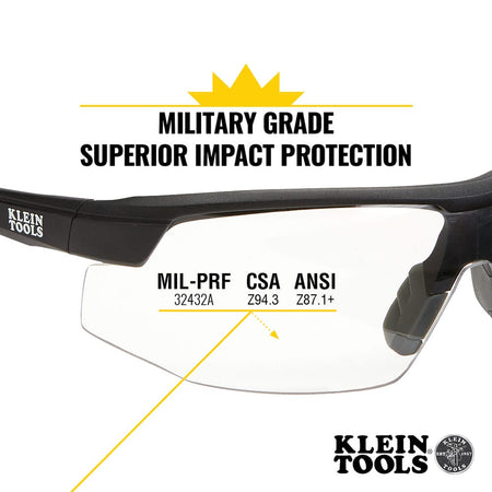 Klein Tools safety glasses with certification text on a white background