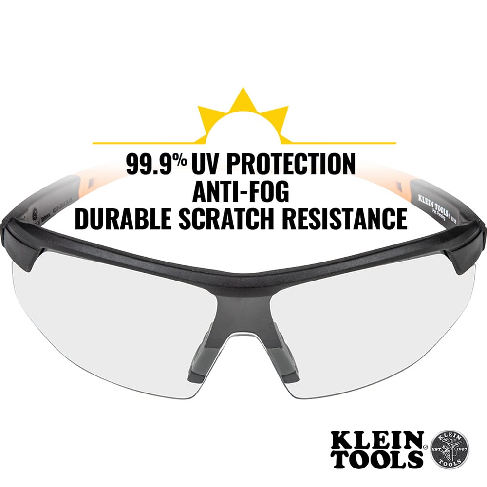 Safety glasses with black frames and clear lenses, featuring Klein Tools branding and text about UV protection and durability.