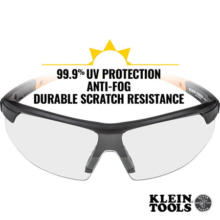 Safety glasses with black frames and clear lenses, featuring Klein Tools branding and text about UV protection and durability.