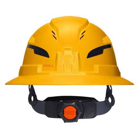 A yellow hard hat with a black chin strap and an orange dial, shown against a plain white background. The hard hat has molded ventilation slots and the text 'TYPE 2' printed on the side.