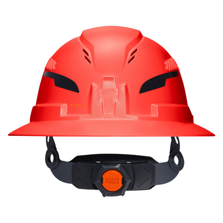 A bright red hard hat with a black adjustable chin strap and an orange dial on the front, shown against a plain white background.