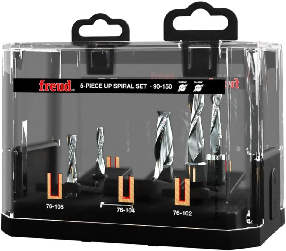 The image shows a clear plastic case containing a Freud 5-piece up spiral bit set. Inside the black base are five silver drill bits of varying sizes, each held in place with orange supports.