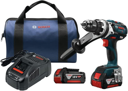 The image shows a Bosch cordless drill kit, including a blue and black drill with a black auxiliary handle attached. The kit also features a blue carrying bag with the red Bosch logo, a black battery charger with a cord, and a black and red 18V battery pack.