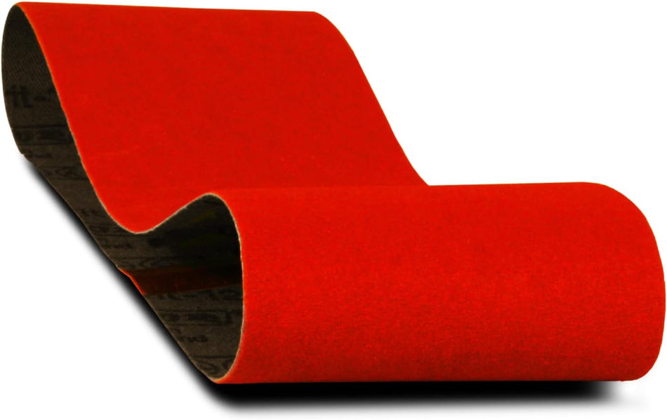 The image shows a bright red Diablo sanding belt that is partially unrolled. The belt has a textured surface and a visible seam where the ends are joined.