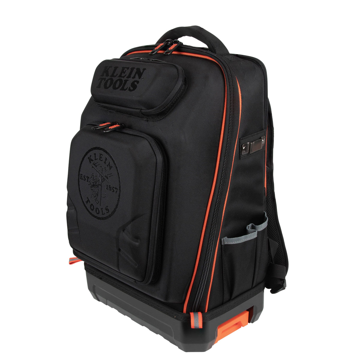 A black Klein Tools rolling tool bag with orange accents, featuring a top handle, front utility pockets, and a wheeled base, shown on a plain white background.