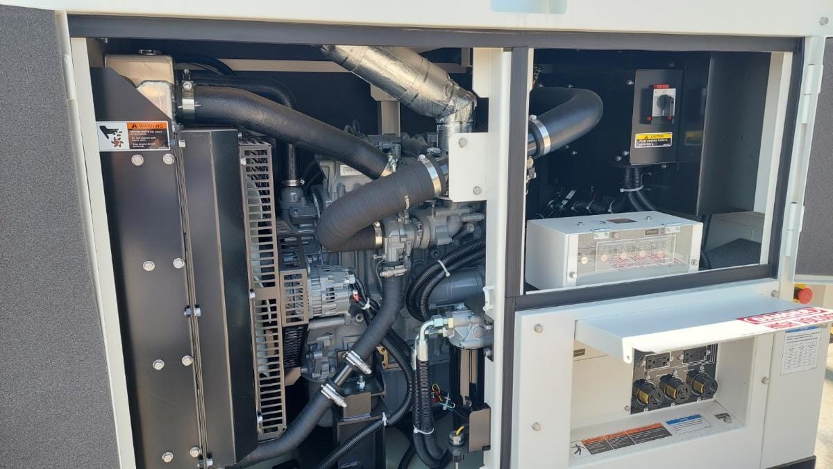 Engine campartment open with the opperating controlls visiable.