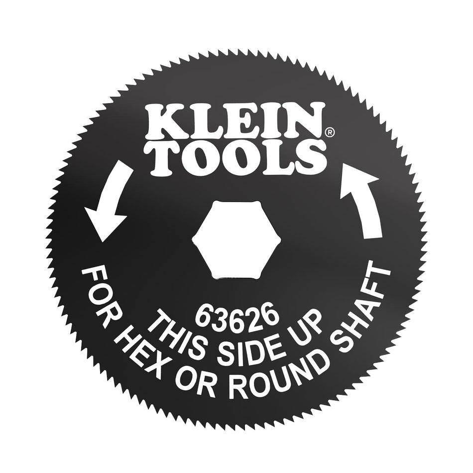 A circular black Klein Tools saw blade insert with white text and arrows, shown on a plain white background.