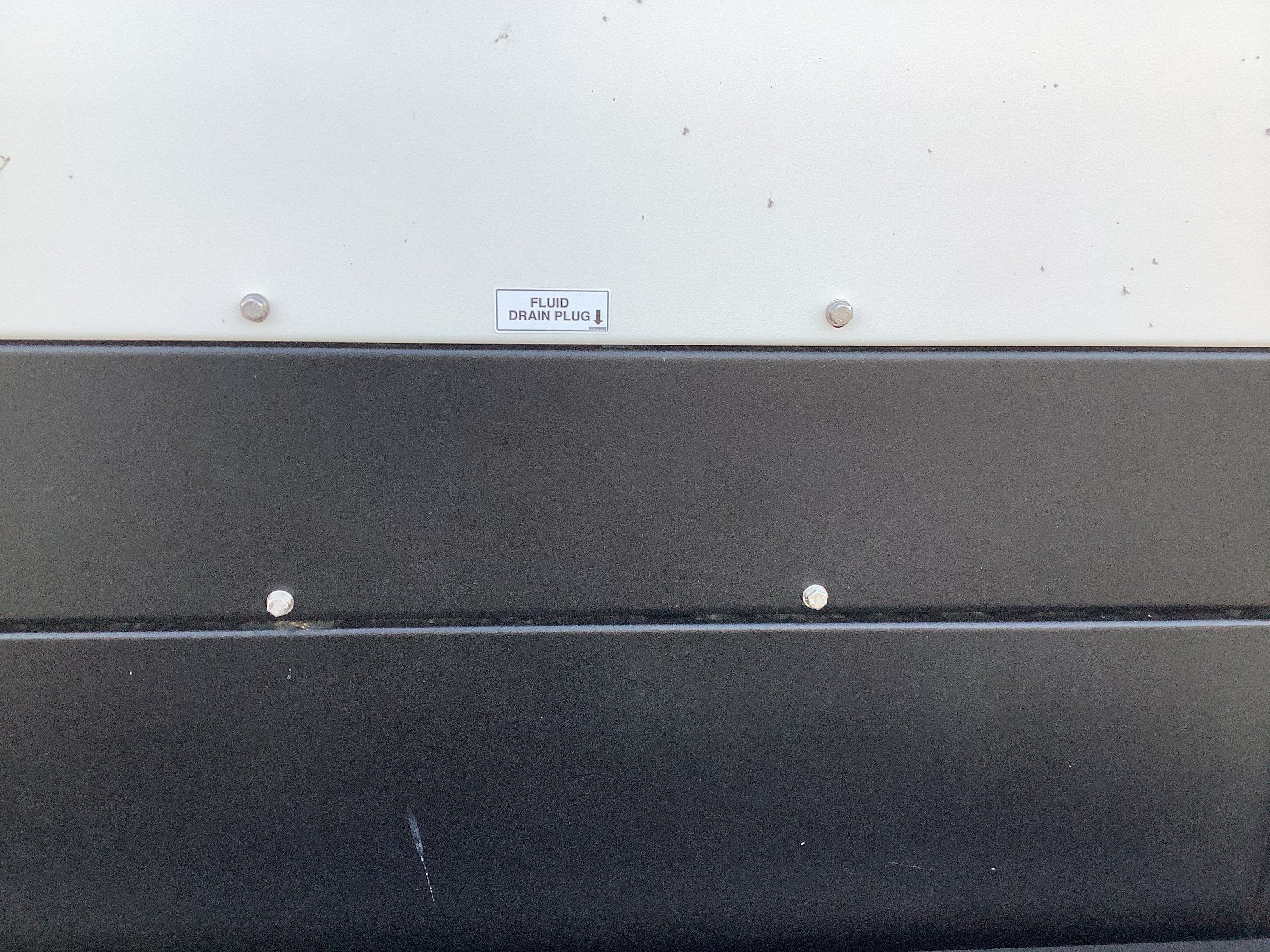 Picture of the flui drain plug sticker