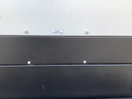 Picture of the flui drain plug sticker