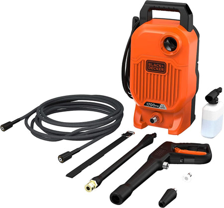 pressure washer with accessories. 
The image displays a Black & Decker 1700 PSI pressure washer kit, dominated by the compact, orange and black main unit with a handle on top. Scattered around the unit are its accessories, including a coiled black hose, a black spray gun, two wand extensions, a small bottle for soap, and various nozzles.