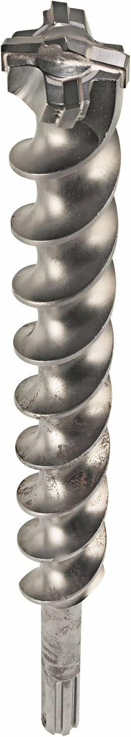 This is a close-up, eye-level shot of a long, silver-colored drill bit, standing upright against a white background. The drill bit has a distinctive spiral fluting along its entire length, resembling a large screw, and a segmented, non-threaded tip at the bottom.