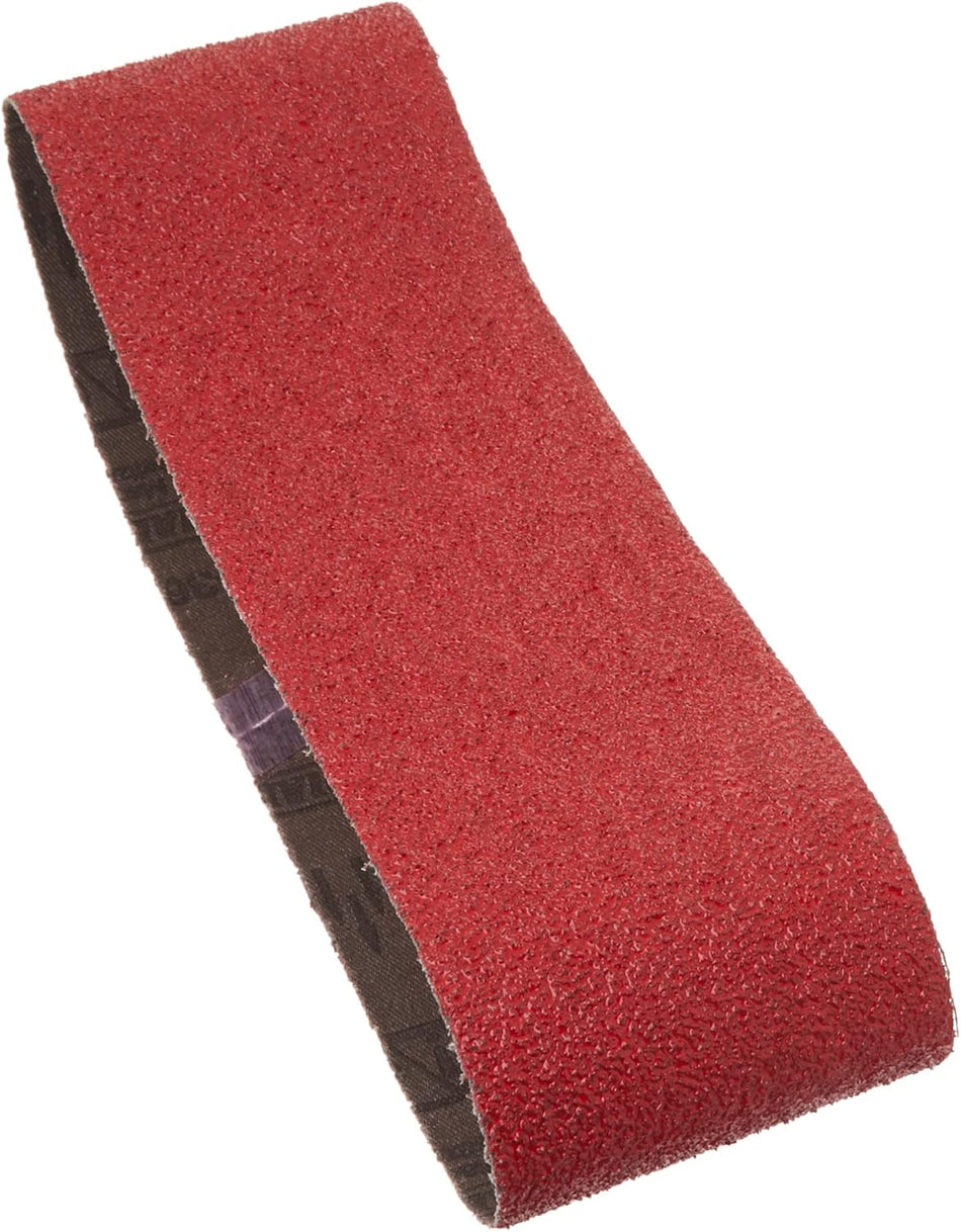 The image shows a Scotch Brite belt sander belt and a Freud 3-inch by 21-inch 120-grit hook and loop sanding belt. The Scotch Brite belt has a textured surface, while the Freud belt is likely made of a different material, designed for sanding.