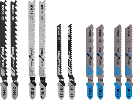 
This image displays an assortment of Bosch jigsaw blades, arranged in pairs and standing vertically, showcasing their various designs and materials. From left to right, the blades transition from wide, black wood-cutting blades, to thinner silver wood-cutting blades, to medium-width black and silver wood-cutting blades, and finally to more metallic-looking blue and silver blades designed for metal.