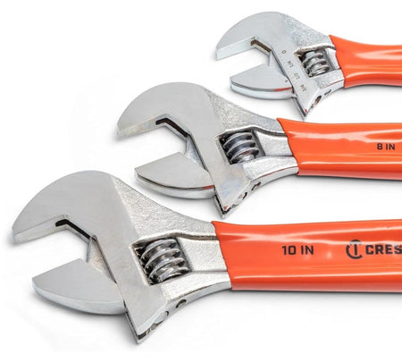 A close-up of the 10-inch, 8-inch, and 6-inch Crescent adjustable wrenches showing the laser-etched SAE and Metric measurement scale on the jaws and the bright orange handles.