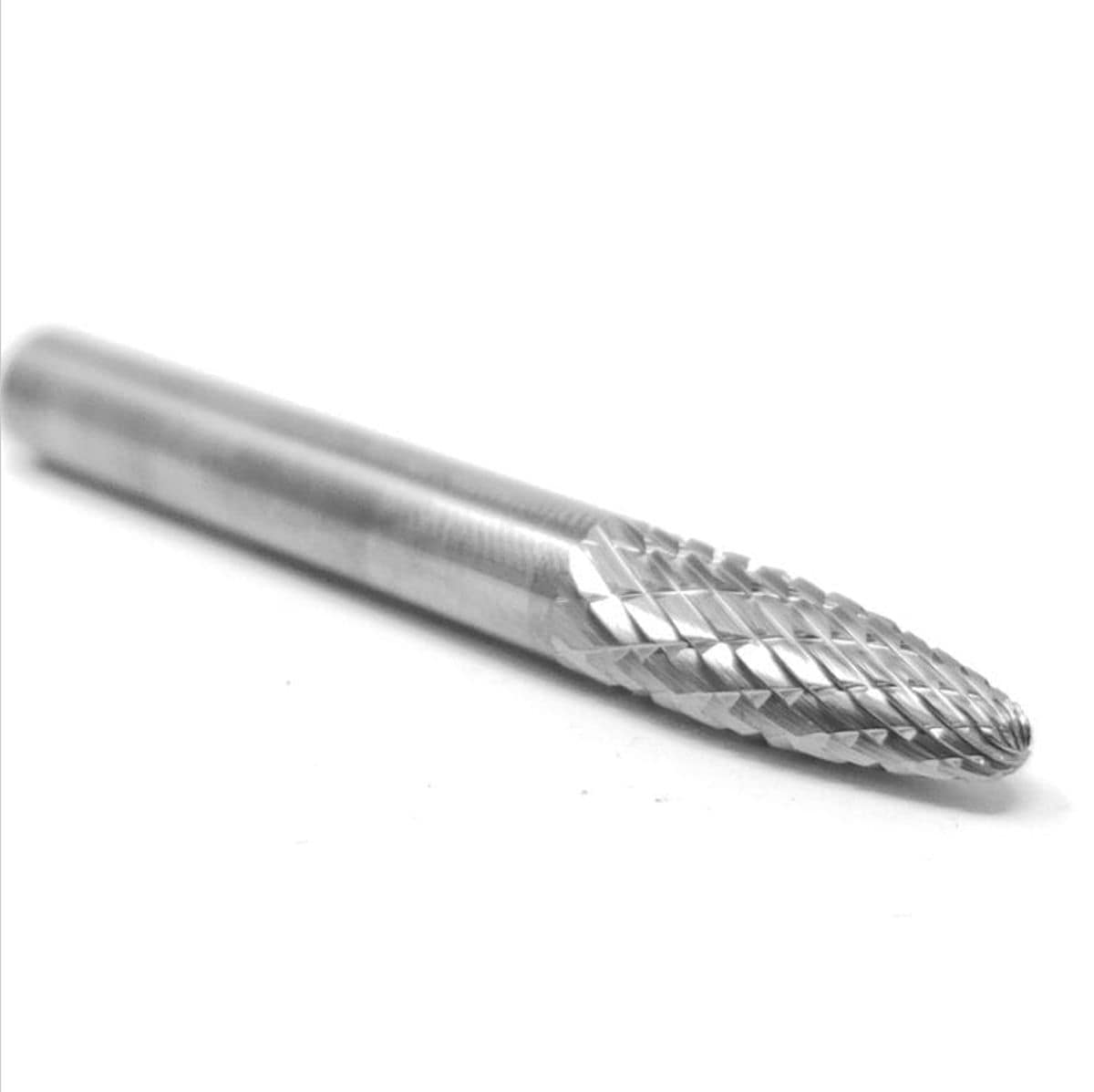 A side profile studio shot of the UCT Gem Carbide SF-1 burr, showing the 1/4-inch shank and the double-cut, tree-shaped radius end head.