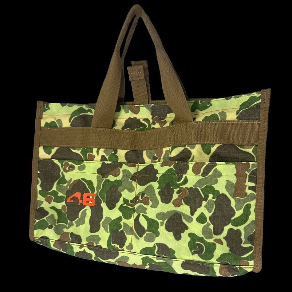 Atlas 46 Frog Skin Camo 1000D nylon Quick Tool Bag showcasing heavy-duty webbing handles and spacious front pockets for fast gear access.