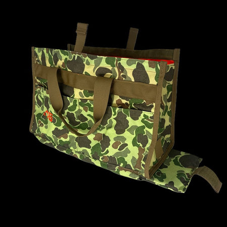 Atlas 46 Quick Tool Bag side profile highlighting the bottom-access compartment where the padded kneeling mat slides out for floor work.