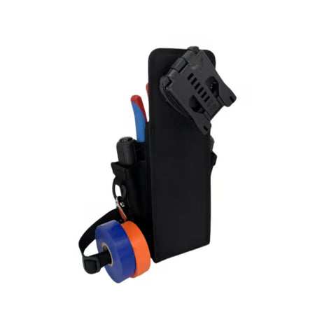 The solid black back panel view of the Atlas 46 semi-rigid tool pouch showing the attached AIMS platform quick clip mounting hardware mechanism used for rotating belt attachment.