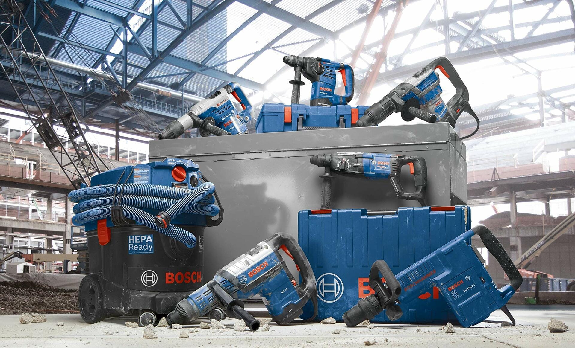 Bosch power tools on a construction site with a large storage container.