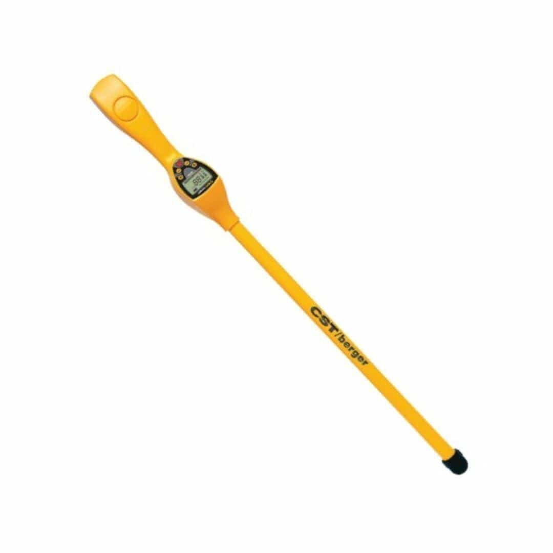 Yellow CST/berger MagnaTrak 100 Series magnetic locator with digital display and control buttons near the top. Used to detect buried ferrous objects such as survey markers and pipes. Bright color enhances visibility in outdoor environments.