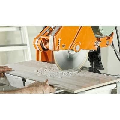 BOSCH DB843S 8 in. Standard Continuous Rim Diamond Blade cutting tile in wet/dry applications with 5/8 in. arbor.