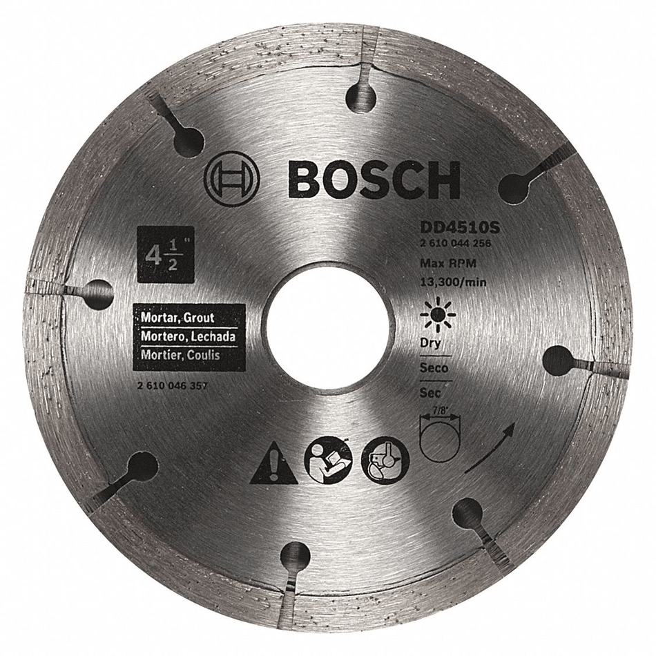 Close-up of a BOSCH DD4510S 4-1/2 inch diamond sandwich tuckpointing blade showing the industrial diamond segments, the 7/8-inch arbor, and safety icons for dry cutting mortar and grout removal.
