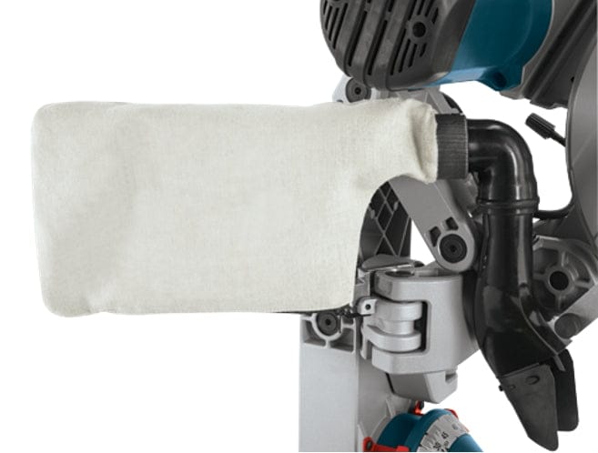 Close-up view of the included white cloth dust collection bag attached to the rear dust chute elbow behind the motor housing