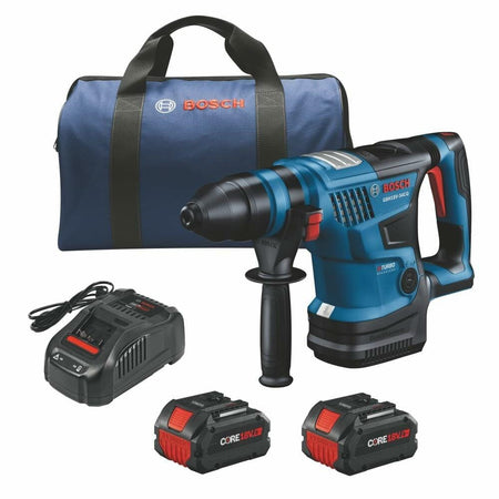 The Bosch PROFACTOR Bulldog rotary hammer shown with the included two CORE18V batteries, fast charger, and blue carrying bag.