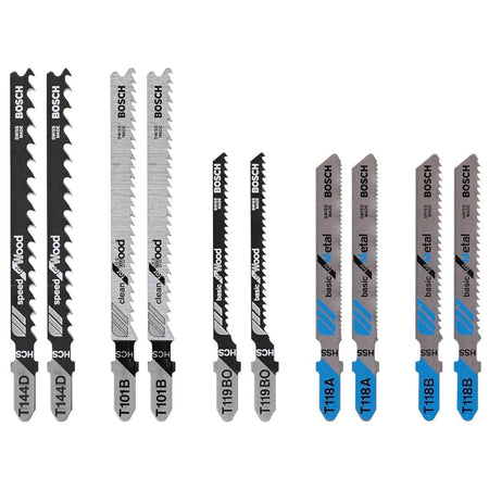 
This image displays an assortment of Bosch jigsaw blades, arranged in pairs and standing vertically, showcasing their various designs and materials. From left to right, the blades transition from wide, black wood-cutting blades, to thinner silver wood-cutting blades, to medium-width black and silver wood-cutting blades, and finally to more metallic-looking blue and silver blades designed for metal.