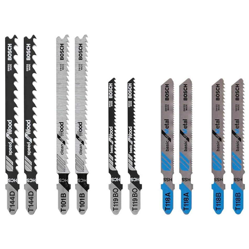 
This image displays an assortment of Bosch jigsaw blades, arranged in pairs and standing vertically, showcasing their various designs and materials. From left to right, the blades transition from wide, black wood-cutting blades, to thinner silver wood-cutting blades, to medium-width black and silver wood-cutting blades, and finally to more metallic-looking blue and silver blades designed for metal.