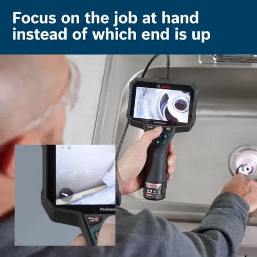 Bosch inspection camera used to examine drain interior; screen shows live feed of pipe with visible obstruction.