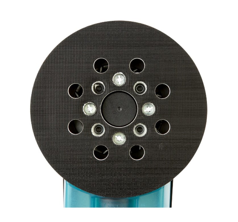 Bottom view of circular sanding pad with dust extraction holes attached to Bosch electric sander, showing textured grip and blue tool body.