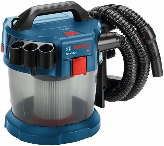 Bosch GAS18V-3N cordless vacuum with transparent dust container, coiled hose, and multiple nozzle attachments mounted on the side.