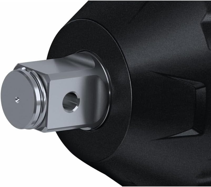 Close-up of a metallic fitting inserted into a black cylindrical housing, showing detailed machining and design for industrial fluid systems