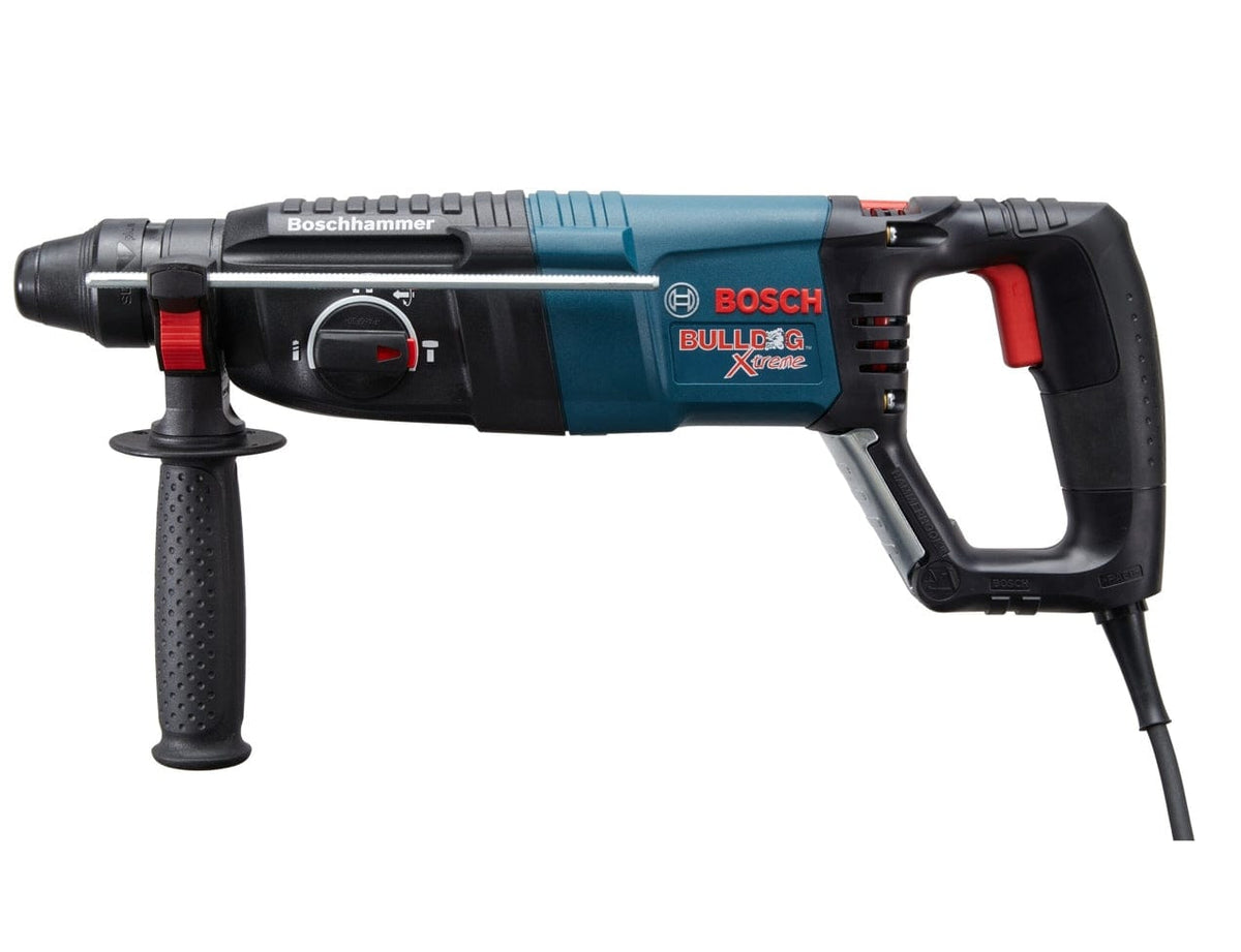 Side profile view of the rotary hammer showing the depth gauge rod attached to the side handle, the red mode selector switch, and the comfortable D-handle grip.