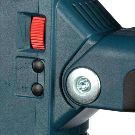 A detailed close-up of the red variable speed dial and the mode selector switch on the side of the tool housing.
