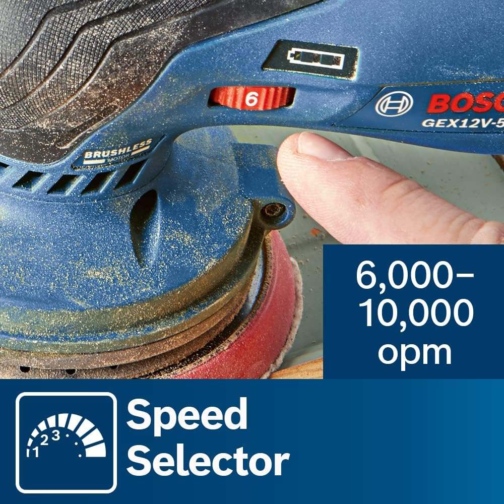 Close-up of Bosch GEX12V-5 sander with hand adjusting speed dial; sanding disc in contact with dusty surface.