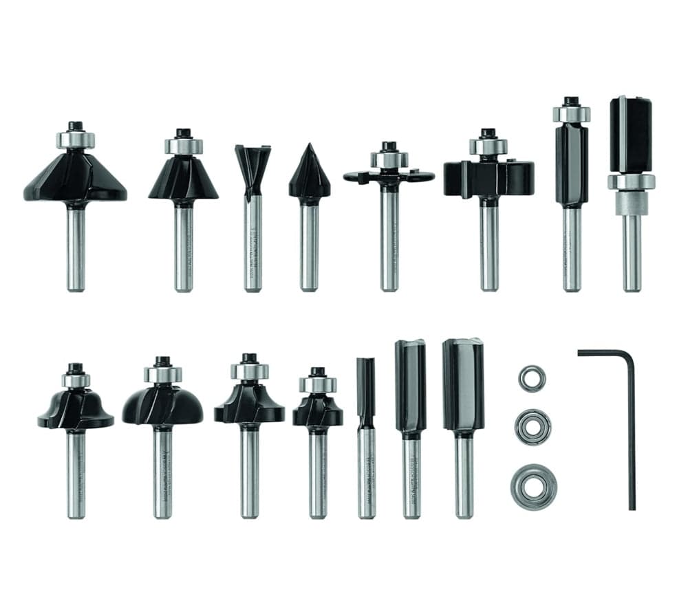 Studio view of the fifteen piece router bit set arranged in rows showing the various profiles and included hex key.