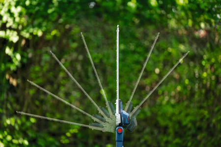 A multi-exposure graphic demonstration illustrating the articulation capabilities of the pivoting trimmer head. Semitransparent overlays map out a full sweeping path of movement adjusting across multiple fixed positions from -45 to +90 degrees.