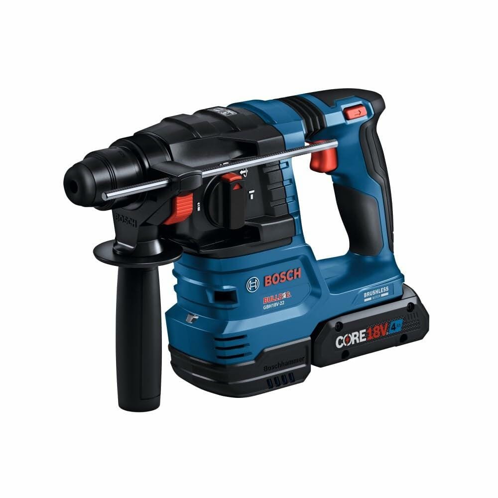 Three-quarter view of the Bosch GBH18V-22 18V Rotary Hammer with the CORE18V 4Ah battery attached, showing the L-shaped body, auxiliary handle, and the chuck positioned for drilling.
