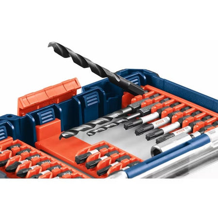 A close-up of the Bosch Custom Case's customizable interior, showing the orange bit clips holding both screwdriving bits and drill bits.